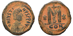 Justin I, 518-527. Follis (bronze, 15.18 g, 33 mm), Constantinople. DN IVSTINVS PP AVG Diademed, draped, and cuirassed bust right. Rev. Large M; cross...