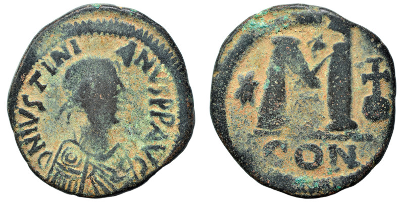 Justinian I, 527-565. Follis (bronze, 22.80 g, 41 mm), Constantinople. Pearl-dia...