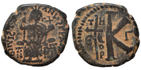 Justinian I, 527-565. Half follis (bronze, 9.00 g, 26 mm), Theoupolis (Antioch). DN VISTINIANVS PP AVG Justinian seated facing, holding long scepter a...