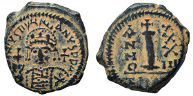 Justinian I, 527-565. Decanummium (bronze, 5.11 g, 22 mm), Theoupolis (Antioch). D N IVSTINI-ANVS P P AVG Helmeted and cuirassed bust of Justinian I f...