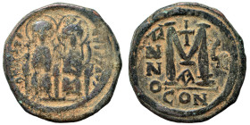 Justin II, with Sophia, 565-578. Follis (bronze, 14.11 g, 28 mm), Constantinople. Nimbate figures of Justin and Sophia seated facing on double throne,...