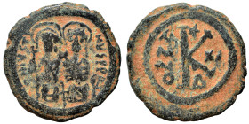 Justin II, with Sophia. 565-578. Half follis (bronze, 6.71 g, 24 mm), Theoupolis (Antioch). Justin II, holding scepter in his right hand, and Sophia, ...