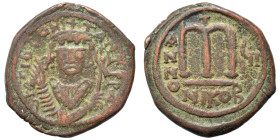 Tiberius II Constantine, 578-582. Follis (bronze, 11.65 g, 30 mm), Nicomedia. δ m TIb CONSTANT P P A[..] Bust of Tiberius II Constantine, wearing crow...