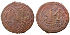 Maurice Tiberius, 582-602. Follis (bronze, 11.62 g, 30 mm), Theoupolis (Antioch). d N MAVRI C N P AVT Crowned bust of Maurice facing, wearing consular...