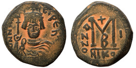 Maurice Tiberius, 582-602. Follis (bronze, 11.50 g, 28 mm), Nicomedia. Crowned and cuirassed facing bust, holding globus cruciger and shield. Rev. Lar...