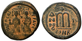 Phocas, with Leontia, 602-610. Follis (bronze, 10.66 g, 29 mm), Constantinople. Phocas, holding globus cruciger, and Leontia, holding cruciform sceptr...