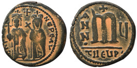 Phocas, with Leontia, 602-610. Follis (bronze, 9.87 g, 28 mm), Theoupolis (Antioch). O N FOCA NЄ PЄ AV Phocas standing facing, holding globus cruciger...