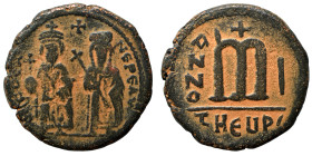 Phocas, with Leontia, 602-610. Follis (bronze, 10.17 g, 26 mm), Theoupolis (Antioch). O N FOCA NЄ PЄ AV Phocas standing facing, holding globus crucige...