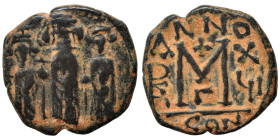 Heraclius, with Martina and Heraclius Constantine, 610-641. Follis (bronze, 5.73 g, 23 mm), Constantinople. Heraclius between Martina, on left, and He...