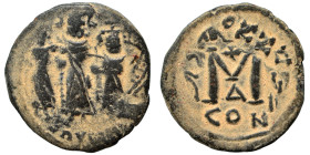Heraclius, with Martina and Heraclius Constantine, 610-641. Follis (bronze, 5.73 g, 23 mm), Constantinople. Heraclius between Martina, on left, and He...
