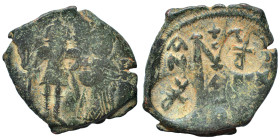 Heraclius, with Heraclius Constantine. 610-641. Follis (bronze, 8.69 g, 31 mm), Constantinople. Heraclius and Heraclius Constantine standing facing, b...