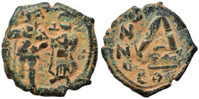 Heraclius, with Heraclius Constantine, 610-641. ¾ Follis (bronze, 7.69 g, 25 mm), Constantinople. Heraclius, on the left, standing facing in military ...