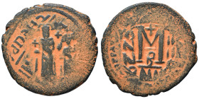 Heraclius, with Martina and Heraclius Constantine, 610-641. Follis (bronze, 10.28 g, 30 mm). Heraclius between Martina, on left, and Heraclius Constan...