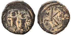 Heraclius, with Heraclius Constantine, 610-641. Half Follis (bronze, 1.90 g, 19 mm). Heraclius, on the left, standing facing, wearing crown surmounted...