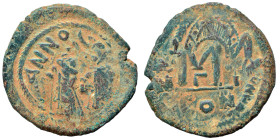 Heraclius, with Heraclius Constantine, 610-641. Follis (bronze, 9.84 g, 29 mm). Overstruck follis. Good fine.