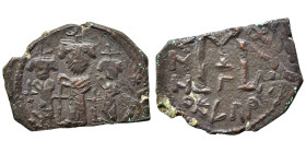 Heraclius, with Martina and Heraclius Constantine, 610-641. Follis (bronze, 5.42 g, 27 mm). Heraclius between Martina, on left, and Heraclius Constant...
