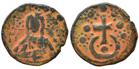 Alexius I Comnenus, 1081-1118. Follis (bronze, 4.01 g, 23 mm), Constantinople. Nimbate bust of Christ facing, wearing tunic and pallium, raising his r...