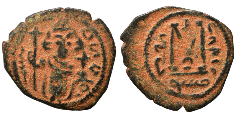 Arab Byzantine. Umayyad Caliphate, circa AD 685-693. Fals (bronze, 1.95 g, 19 mm...