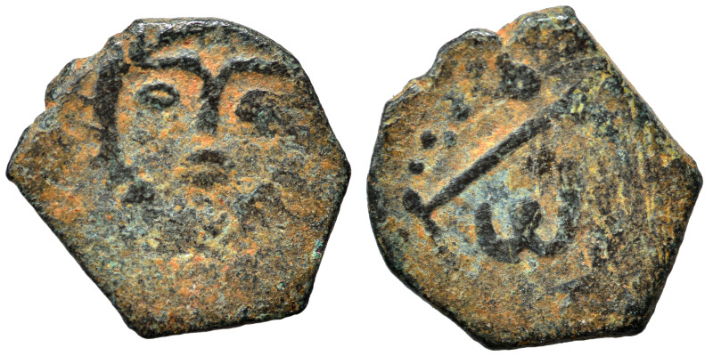 Ilkhanids. Hulagu, AH 654-663 / 1256-1265. AD Fals (bronze, 0.97 g, 13 mm). Sun-...