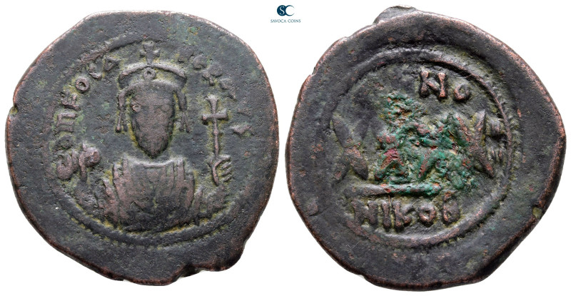 Phocas AD 602-610. Nikomedia
Follis or 40 Nummi Æ

32 mm, 12,79 g



Good...