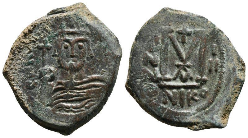 MAURICE TIBERIUS (582-602). Follis. 
Obv: D N ΜΑVRI TIЬЄR P P AV.
Helmeted and c...