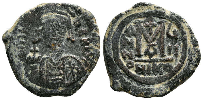 MAURICE TIBERIUS (582-602). Follis. 
Obv: D N ΜΑVRI TIЬЄR P P AV.
Helmeted and c...