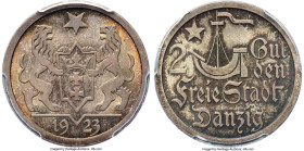 Free City 2 Gulden 1923 MS66 PCGS, KM146. Tied for the highest grade across the major services and bringing strong premiums as such. Beautifully toned...