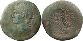Domitian. AE 34; Domitian; 81-96 AD, Rhodes, Caria, AE 34, 24.20g. RPC-1194. Obv: Laureate and radiate head of Domitian l. Rx: Nike standing l. on pro...