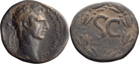 Nerva. AE; Nerva; 96-98 AD, Antioch, Syria, AE, 16.49g. RPC-3478 var. Obv: Laureate head r. Rx: S C within wreath of eight bunches of leaves, Ω below....