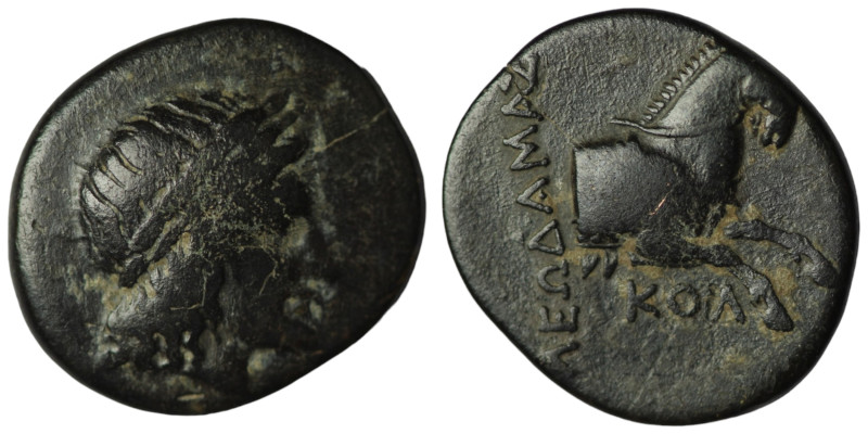 Aeolis. Aigai. (2.-1. Century BC). Bronze Æ. Obv: head of Apollo right. Rev: for...