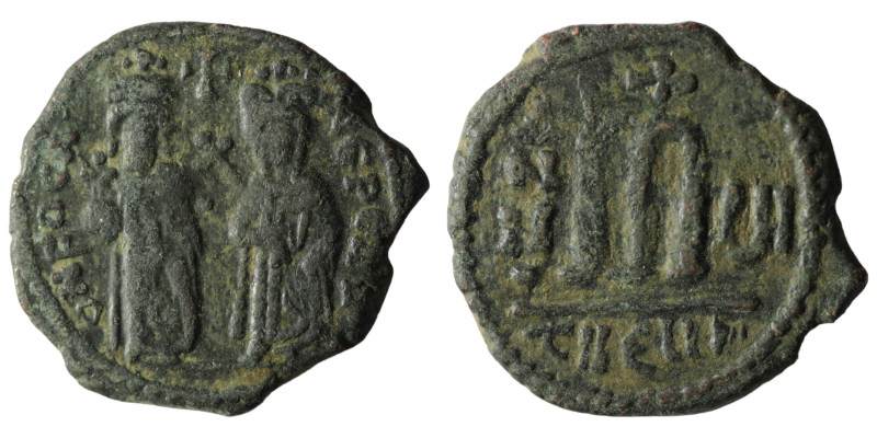 Phocas and Leonita. (602-610 AD) Æ Follis. Theoupolis. Obv: Phocas and Leonita s...