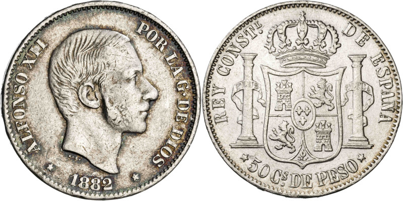 1882. Alfonso XII. Manila. 50 centavos. (AC. 118). 12,66 g. MBC.