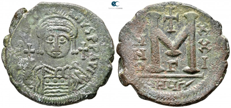 Justinian I. AD 527-565. Theoupolis (Antioch)
Follis Æ

37 mm., 19,80 g.

...