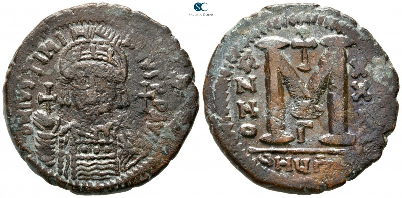 Justinian I. AD 527-565. Theoupolis (Antioch)
Follis Æ

35 mm., 20,18 g.

...
