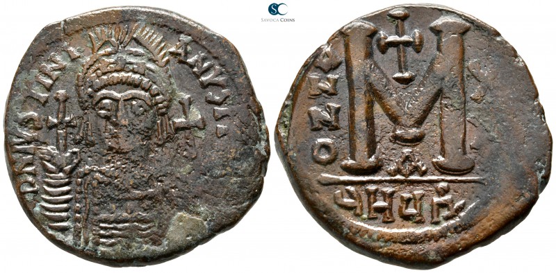 Justinian I. AD 527-565. Theoupolis (Antioch)
Follis Æ

36 mm., 21,51 g.

...