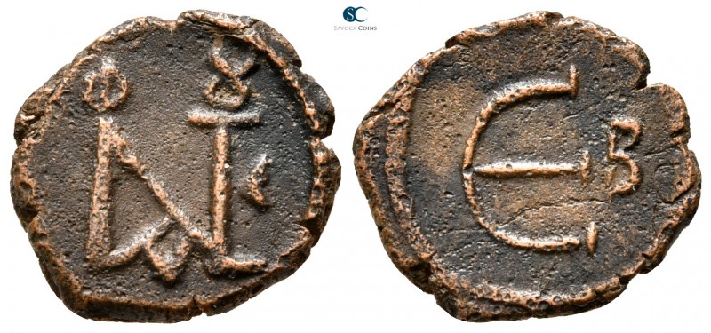Justin II AD 565-578. Constantinople
Pentanummium Æ

15 mm., 1,36 g.



v...
