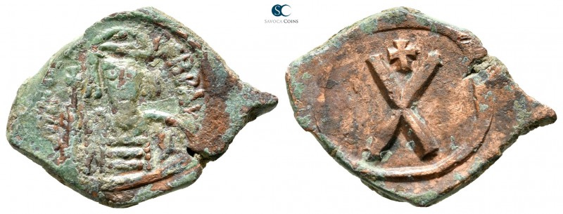 Phocas AD 602-610. Constantinople
Decanummium Æ

24 mm., 3,92 g.



very ...