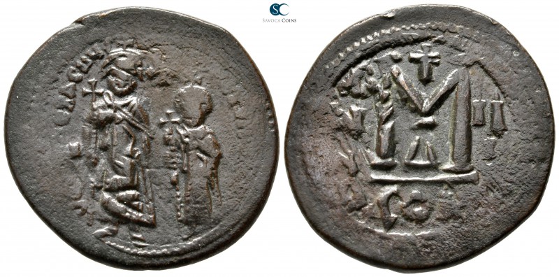 Heraclius with Heraclius Constantine AD 610-641. Constantinople
Follis Æ

32 ...