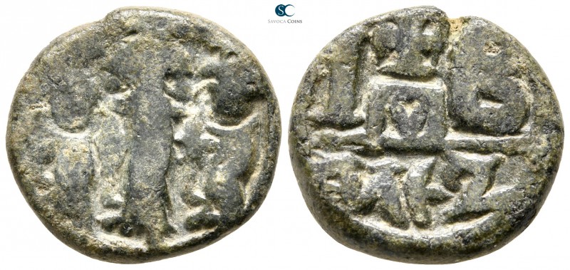 Heraclius, with Heraclius Constantine and Heraclonas AD 610-641. Alexandria
12 ...