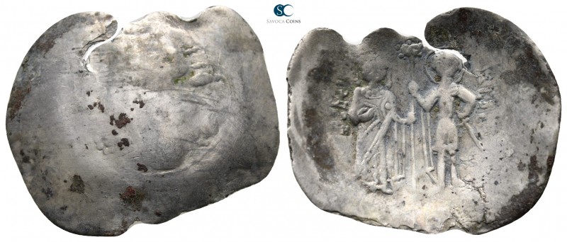 John II Comnenus AD 1118-1143. Thessalonica
Aspron Trachy

30 mm., 2,97 g.
...