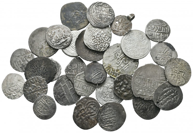 Lot of ca. 30 islamic silver coins / SOLD AS SEEN, NO RETURN!

very fine