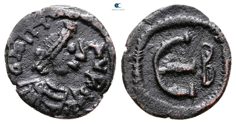 Maurice Tiberius AD 582-602. Constantinople
Pentanummium Æ

13 mm, 1,03 g

...