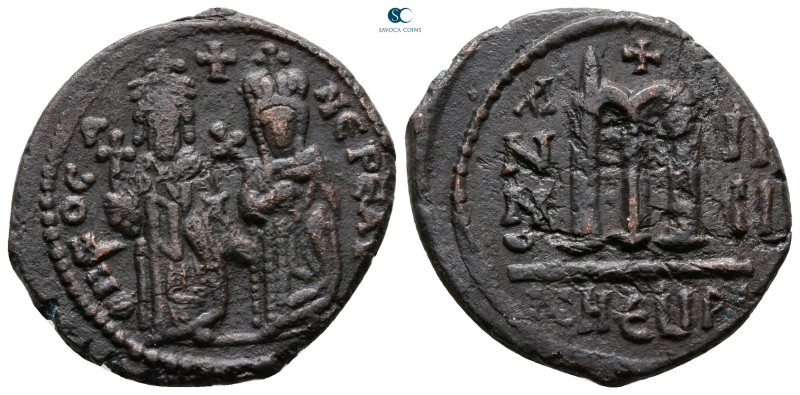 Phocas, with Leontia AD 602-610. Theoupolis (Antioch)
Follis or 40 Nummi Æ

2...