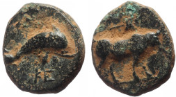 Caria, Keramos, after 400 BC, AE (Bronze, 11.3 mm, 1.27 g).
Obv. Bull standing right, double-axe above.
Rev: Dolphin right, KE below.
Ref: SNG Cop 805...