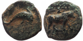 Caria, Keramos, after 400 BC, AE (Bronze, 11.5 mm, 0.94 g).
Obv. Bull standing right, double-axe above.
Rev. Dolphin right, KE below.
Ref: SNG Cop 805...