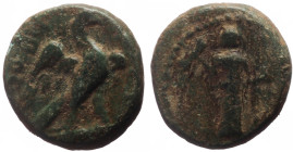 Caria, Euromos, after 100 BC, Æ (Bronze,
11.2 mm, 1.57g)
Obv. Facing cult statue of Zeus Labraundos, with labrys and spear. 
Rev. [EYPΩ]MEΩN,eagle sta...