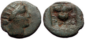 Islands off Caria, Rhodos AE (Bronze, 1.05g, 13mm) ca 188-84 BC. 
Obv: Radiate head of Helios right 
Rev: P-O, rose with bud to left and right, all wi...