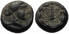 Lydia, Sardes AE (Bronze, 4.67g, 13mm) 2nd-1st centuries BC
Obv: Laureate head of Apollo right, Rev: ΣAPΔIA / NΩN.
Rev: Club right within wreath; mono...