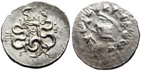 Mysia, Pergamon, cistophoric tetradrachm (Silver, 29.7 mm, 12.27 g), ca. 104-98 BC.
Obv. Serpent emerging from cista mystica with open lid, all within...