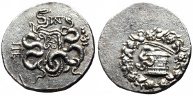Mysia, Pergamon, cistophoric tetradrachm (Silver, 28.6 mm, 12.39 g), ca 123-104.
Obv. Serpent emerging from cista mystica with open lid, all within iv...